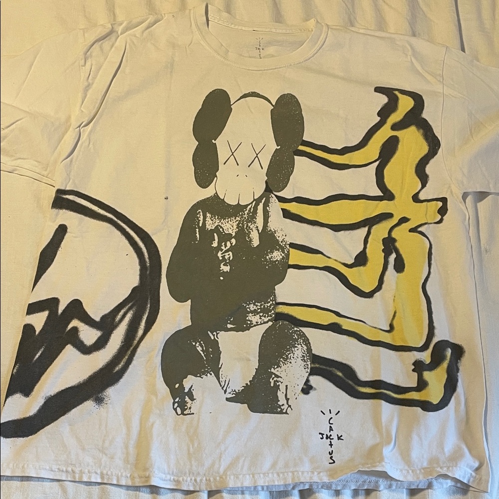 KAWS x Cactus Jack by Travis Scott White Tee with Black and Yellow Design